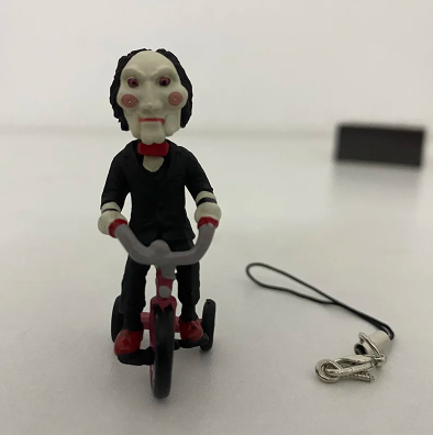 Фигурка Jigsaw на колело – SAW Horror Series